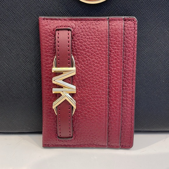 MICHAEL KORS
Reed Large Pebbled Leather Card Holder Case
Dark Cherry 
NWT - Picture 4 of 16